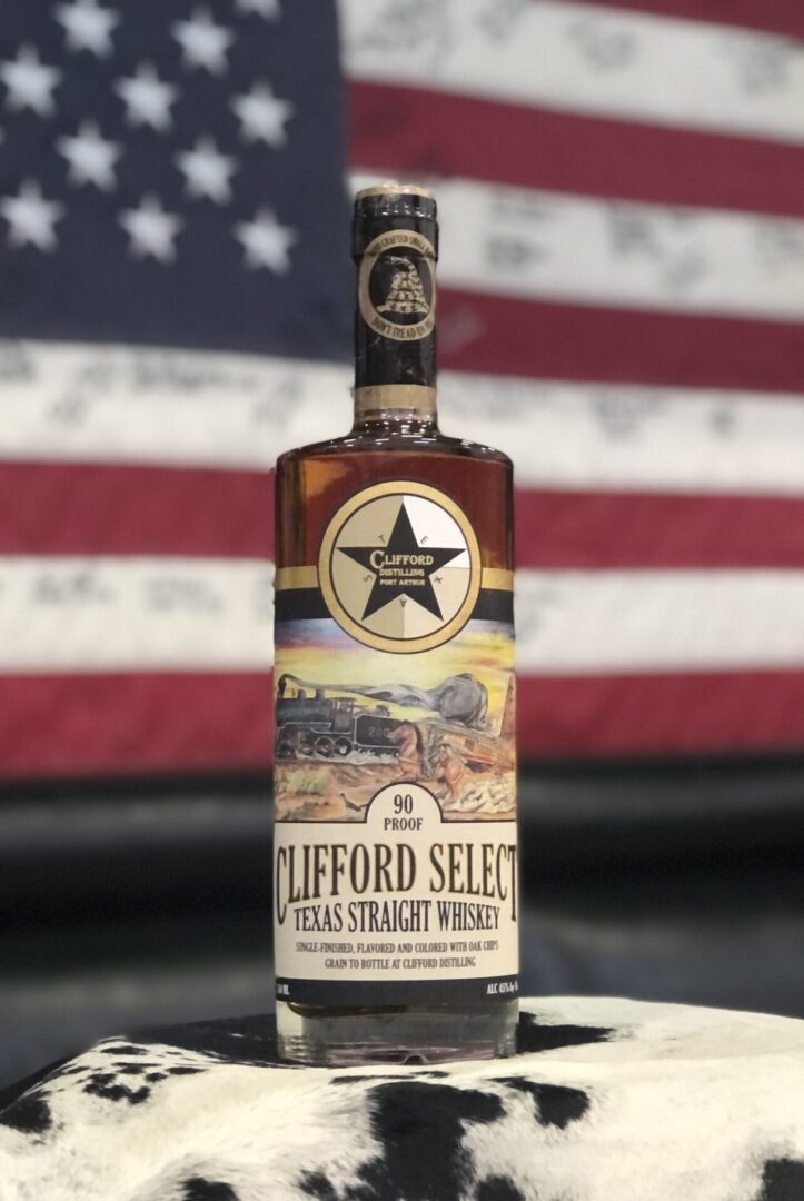 A bottle of clifford select on a cloth